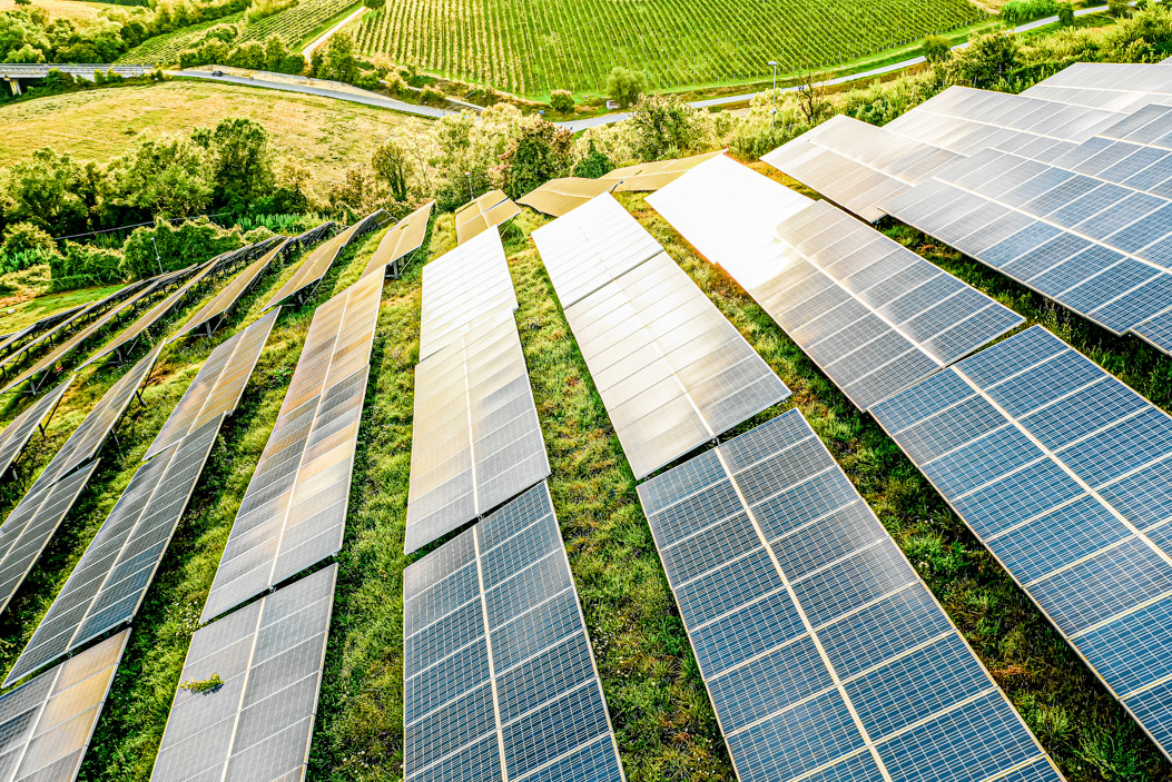 Solar panels fields on the green hills