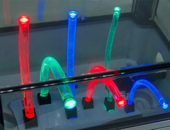 demo kit of UHF silicone flexible light pipes in red, green, and blue light as a showcase