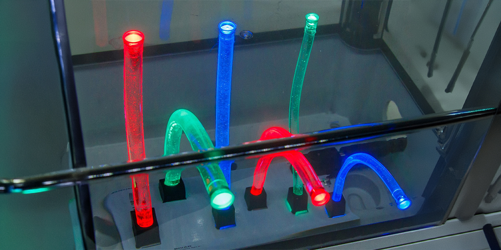 demo kit of UHF silicone flexible light pipes in red, green, and blue light as a showcase
